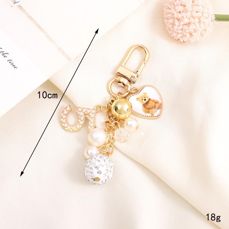 Creative Pearl Bow Pendant Keychain: Exquisite Gift Accessory for Bag or Phone Case