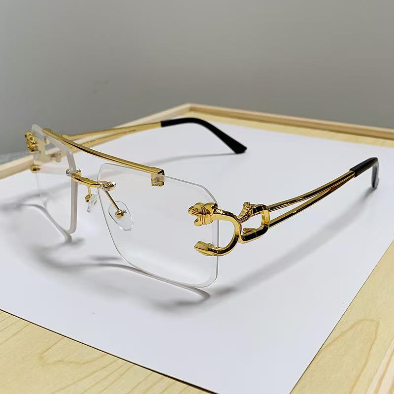 

2025 Fashion Rimless Square Sunglasses with Golden Tiger Head for Men & Women Metal
