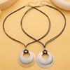 Two Tone Circle Pendant Necklace Black Cord Statement Jewelry