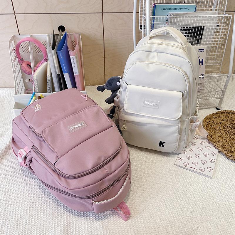 New large-capacity multi-compartment lightweight and versatile backpack fashionable junior high school high school student college backpack