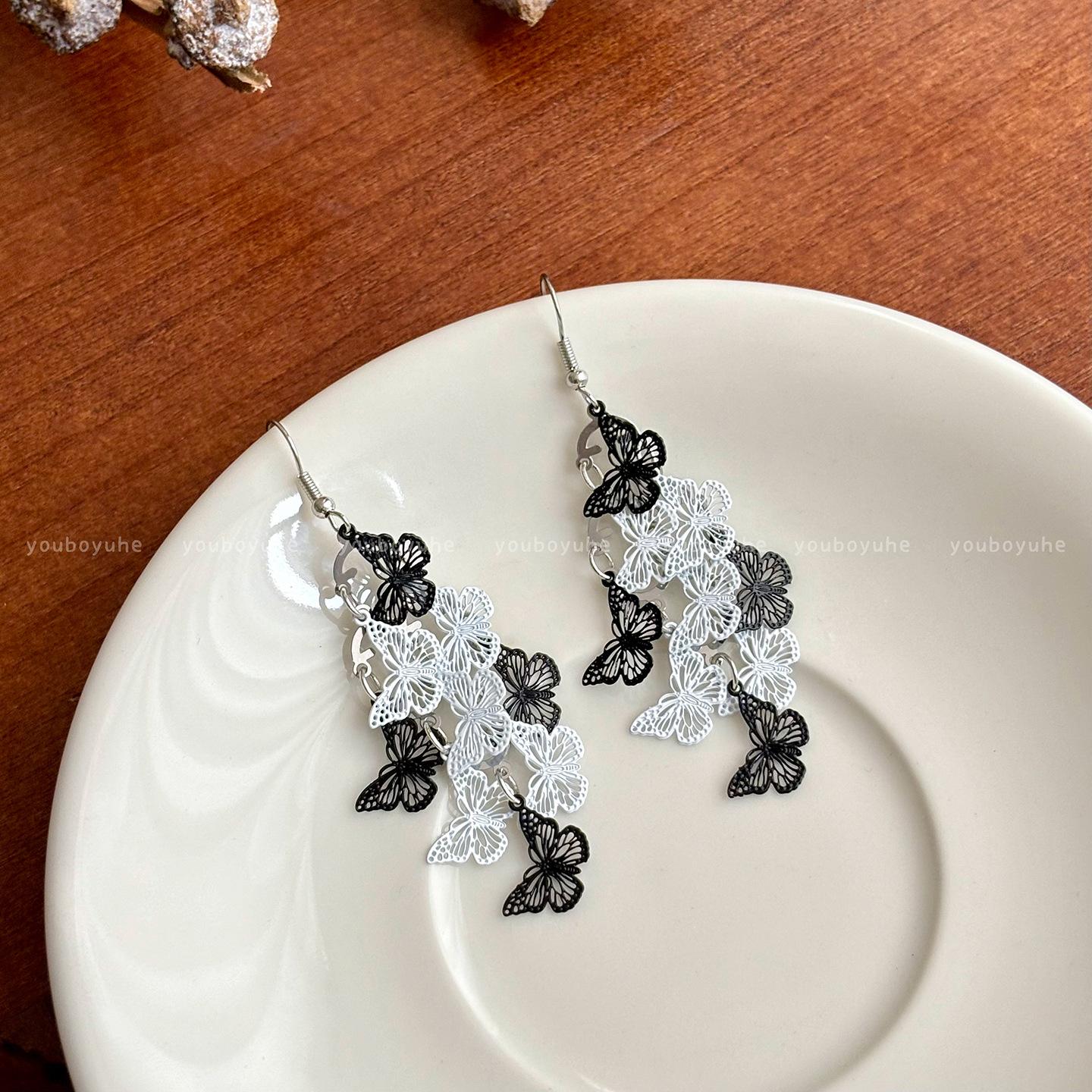 Female Delicate Personalized Hollow Butterfly Tassel Earrings 1 pair of earrings