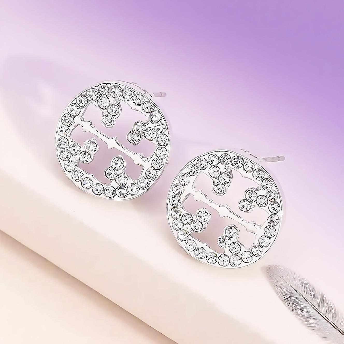 

Stylish and simple commuter niche design inlaid with diamonds hollow small round stud earrings high sense срібло сірий колір