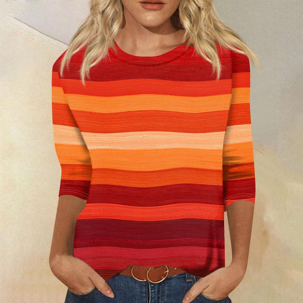 Damtopp med rund hals och trekvartsärm, randig och tryckt