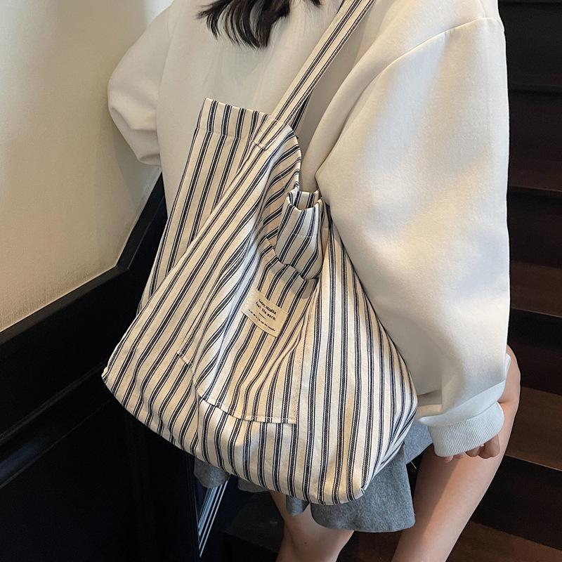 Foreign style texture niche large-capacity bag women's fashion 2025 summer new foreign style canvas shoulder tote bag