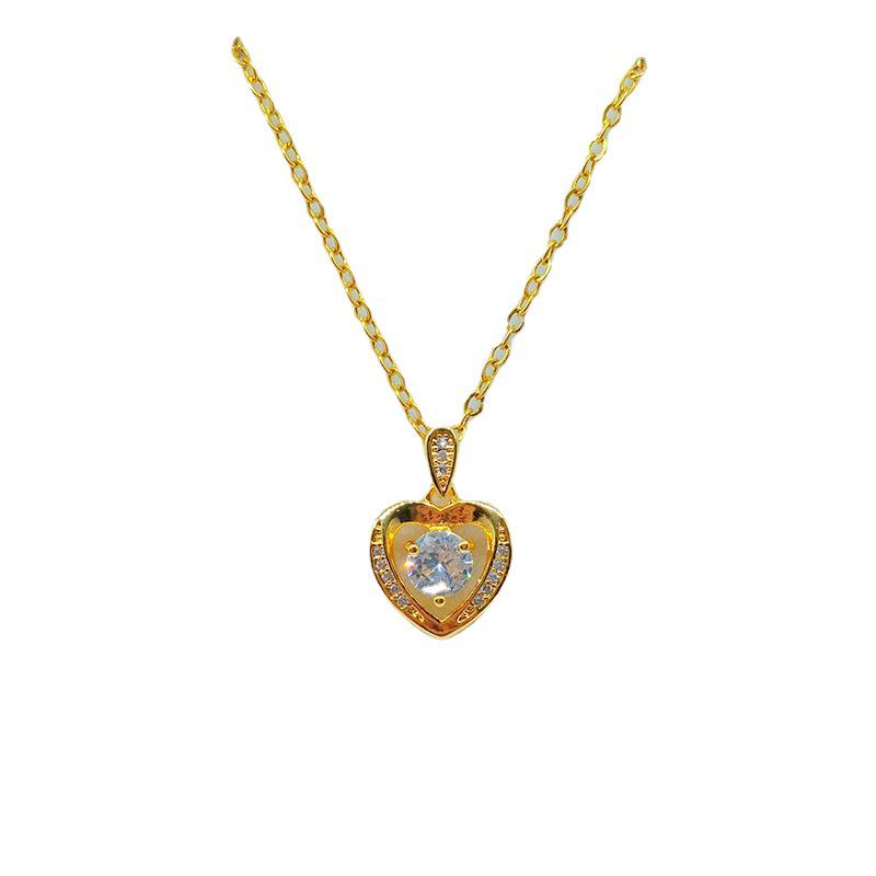 Gold Plated Heart Pendant Necklace with Micro-Paved Diamonds for Women.