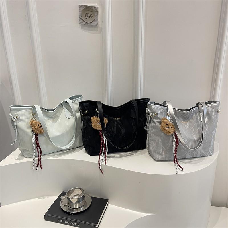 Versatile High-Capacity Crossbody Tote with Trendy Textured Finish