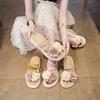 Two-color flower platform slippers female 2025 summer new Korean version fairy wind flat bottom student fashion beach cool slippers