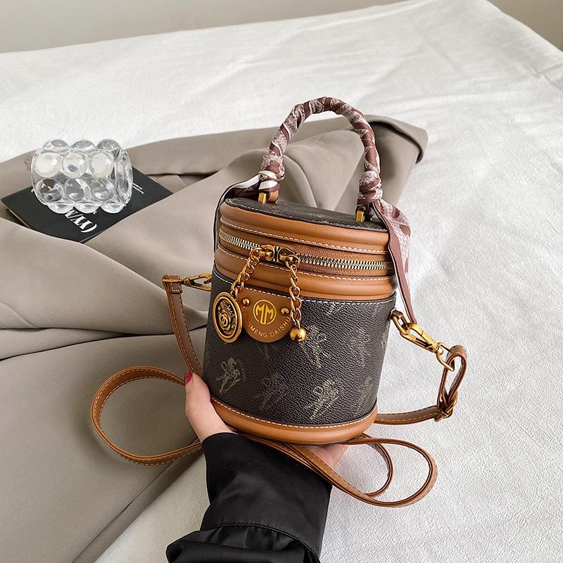 

2025 новая нишевая сумка-цилиндр, модная классическая портативная универсальная сумка-мессенджер, сумка-ведро, женская сумка-цилиндр