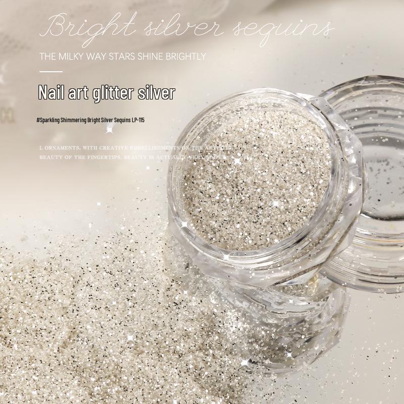 

Bright Silver Glitter Nail Art Accessories: Crushed Silver Foil, Holographic Glitter Sequins, and Stardust Flake Powder.