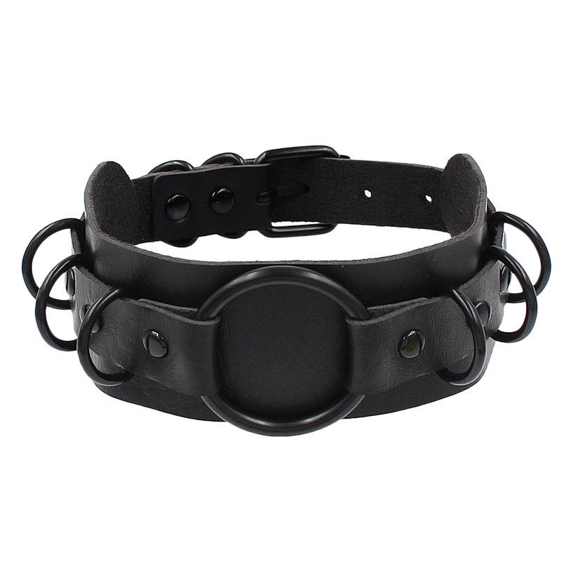 

Ожерелье-ошейник из искусственной кожи в стиле темного панка-готики с увеличенным черным кольцом. чёрный