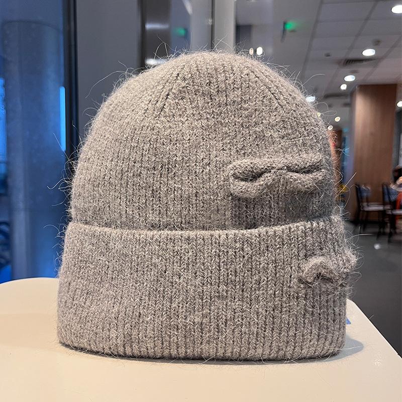 Korean version of fashion hole knitted wool hat men and women autumn and winter outdoor warm bag head cold hat lazy knitted hat