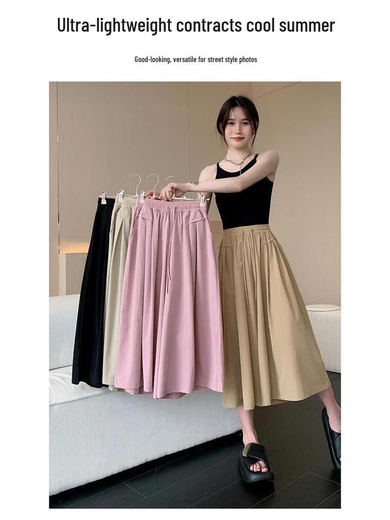 Ledové hedvábí Yamamoto culottes: Zeštíhlující, splývavé kalhoty se širokými nohavicemi na jaro/léto.