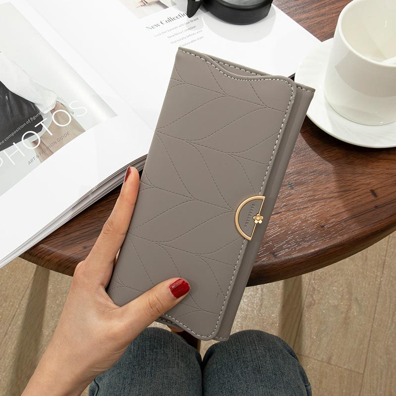 

Long wallet for women, niche design, triple fold, small and fresh coin purse, women s handbag сірий колір
