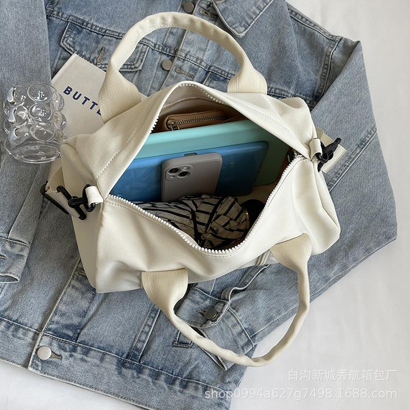 Niche nylon bucket bag simple 2025 new casual shoulder messenger bag versatile hand bag