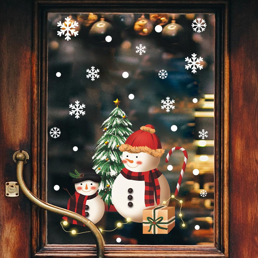 Weihnachtsmann Weihnachtsbaum mit Schnee geschmückt Atmosphäre Glasfenster Fensteraufkleber