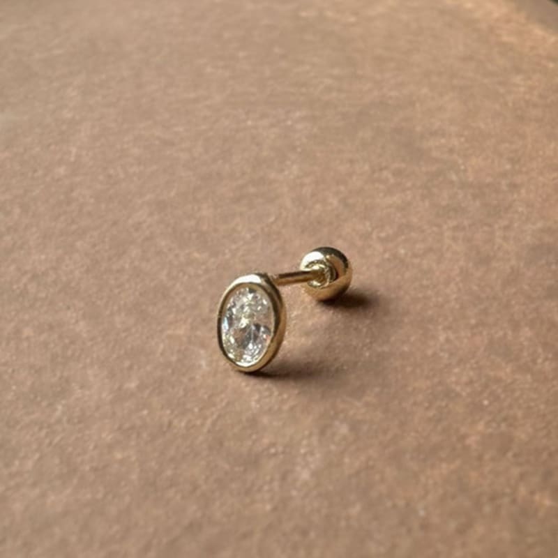 youngglow 14k oval cubic piercing