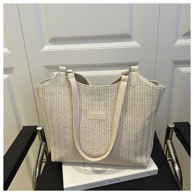 Casual texture simple 2025 new woven fashion trend summer design large capacity women's shoulder tote bag