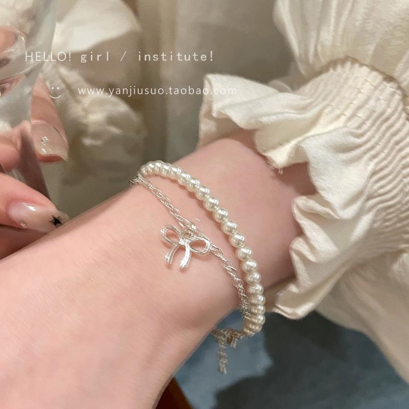 Exquisite Double-Layer Gentle French Bow Pearl Bracelet - High-End Stackable Jewelry for Women