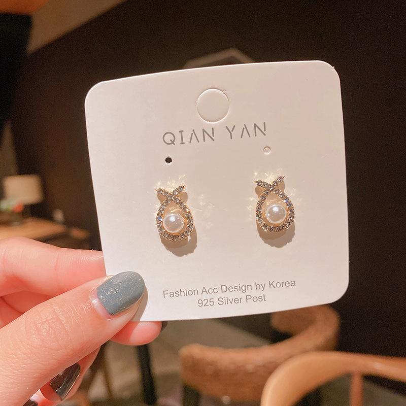 Simple and small cross niche stud earrings Korean versatile temperament fashion earrings girl exquisite earrings wholesale