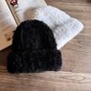 Knitted Winter Hat For Women With Plush Material And High Top Design For Cold Weather Comfort