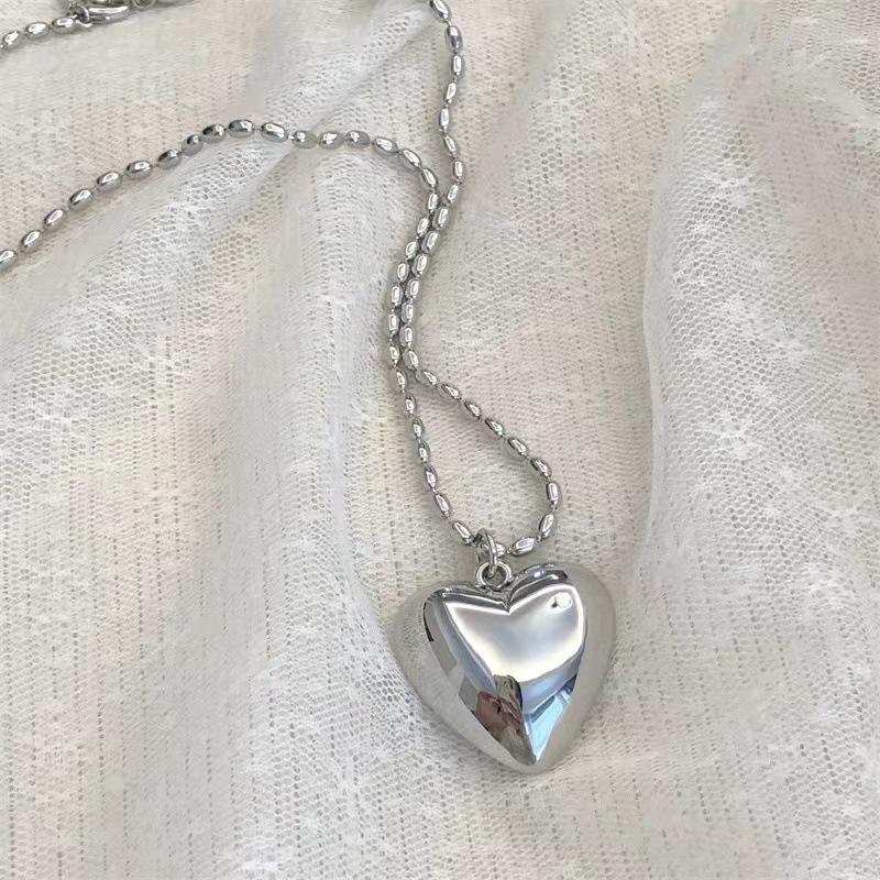 

Korean Titanium Steel Love Necklace: Women s Sunflower Silver Heart Sweater Chain