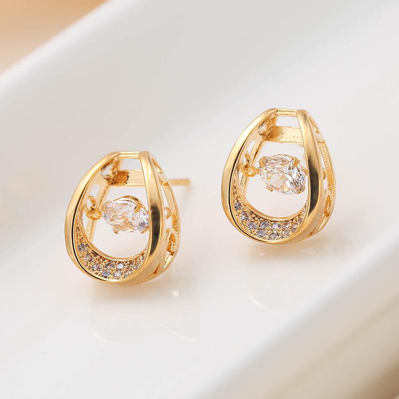 European  American Geometric Hollow Stud Earrings: Creative Diamond-Inlaid Metal Design for Women.