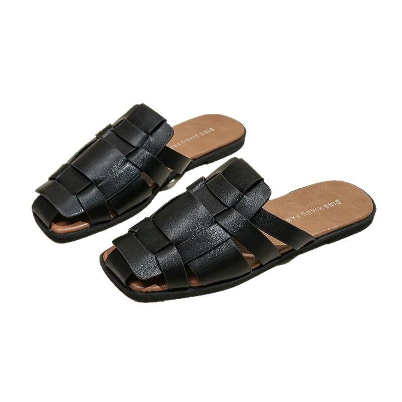 Baotou slippers women's outer wear 2025 summer new retro beach flat-bottomed woven sandals versatile lazy muller shoes