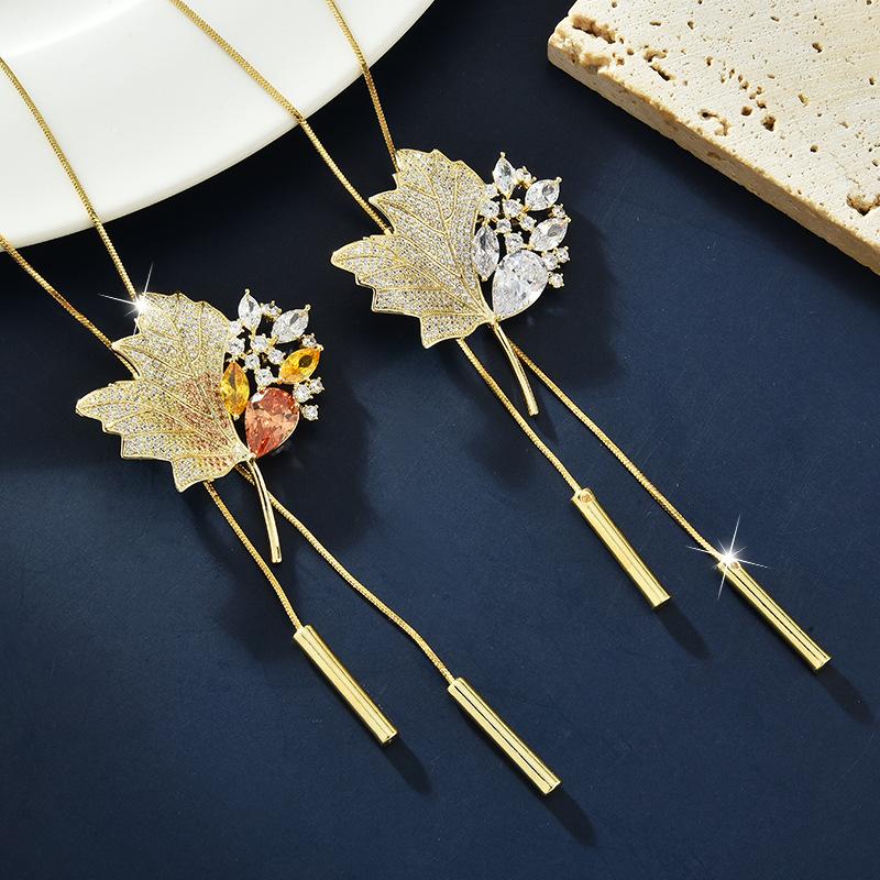 A Pair of Long Necklaces, Maple Leaf Sweaters, Brooches, Women's Coats, Outerwear Accessories