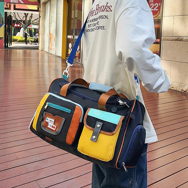 Large capacity short trip bag travel bag handbag women's storage bag light going out duffel bag delivery bag