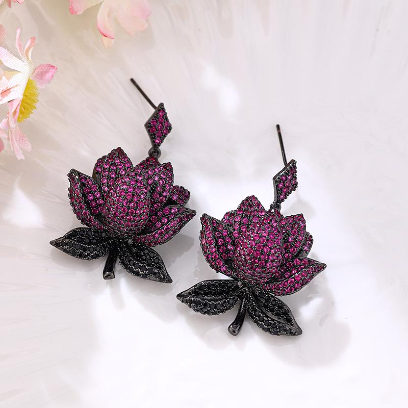 

Элегантные многослойные серьги-лотосы с циркониевой инкрустацией из серебра 925 пробы фиолетовый