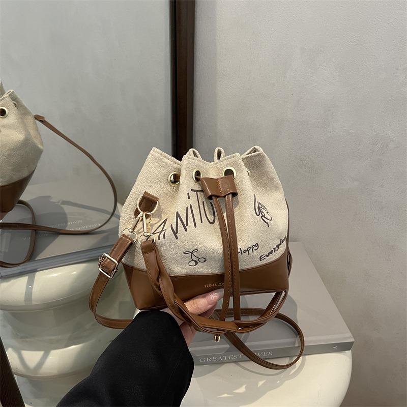 Textured portable bucket bag women's autumn and winter new suede daily commute shoulder bag retro messenger bag