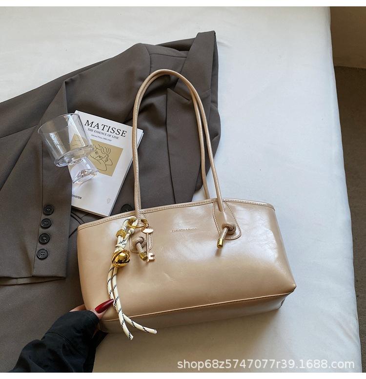 Large-capacity bag women's spring and summer versatile 2025 new simple shoulder armpit bag casual commuting tote bag