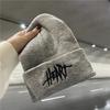 Natural NewStylish Korean Style Knitted Cap with HE Emblem - Ideal for Couples During Cold Season