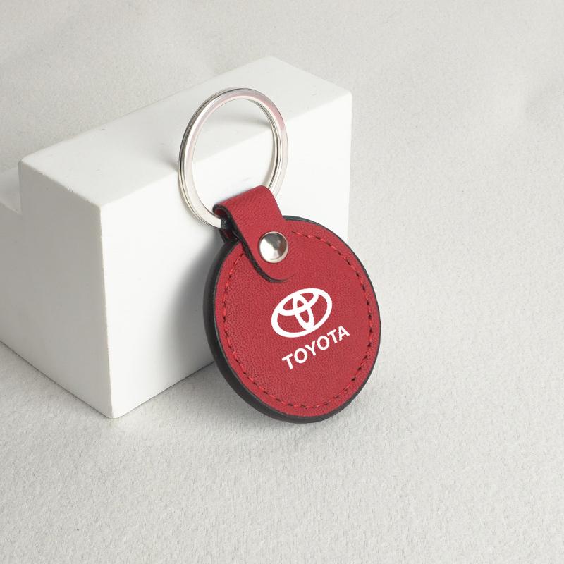 

Leather Key Ring Sport Car Keychain Custom Car Emblem Gift For Toyota Hilux Aygo Yaris Ractis Corolla Camry Auris Tacoma Cruiser