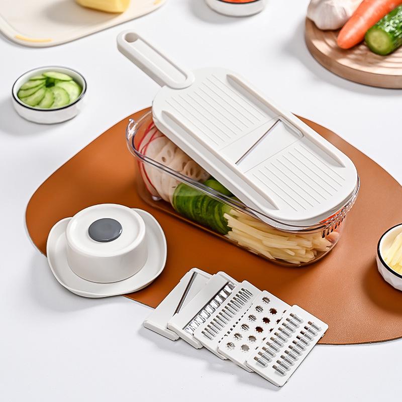Multifunktioneller Küchenschneider: Gemüse- & Kartoffelschneider mit Julienne-Reibe und Handschutz.
