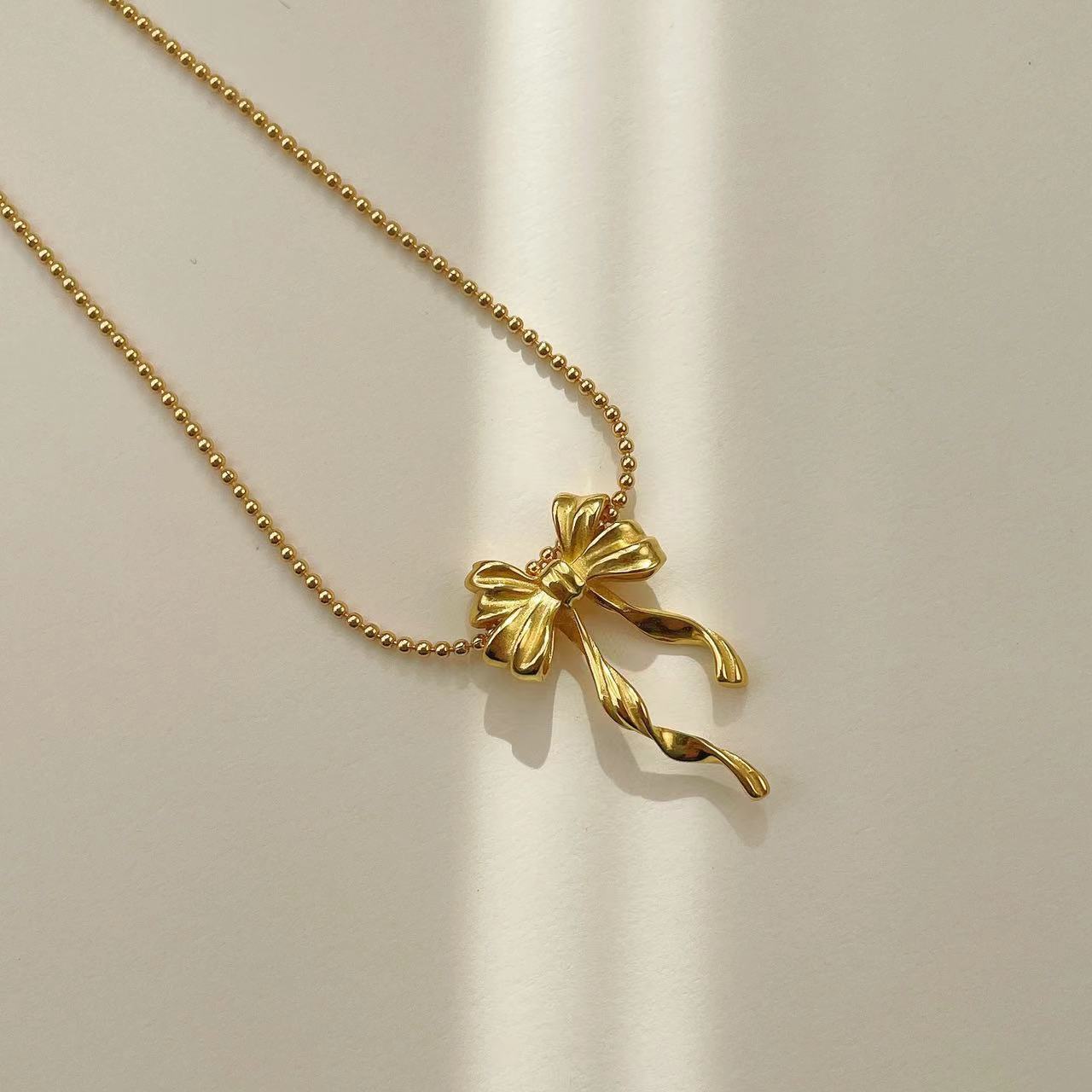 Korean version S925 silver geometric smart ribbon double-layer bow necklace minimalist round bead collarbone chain 925 silver золотой