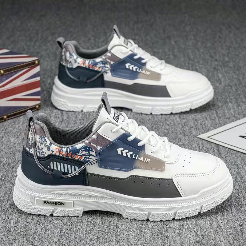 Vår nya låga herrskor sport casual skor unga mäns brädskor koreansk version mode trendiga studentskor