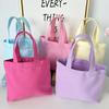 Effenkleurige eenvoudige lunchtas, draagbare canvas tas, kleine stoffen tas, draagbare canvas tas voor het opbergen van diverse spullen