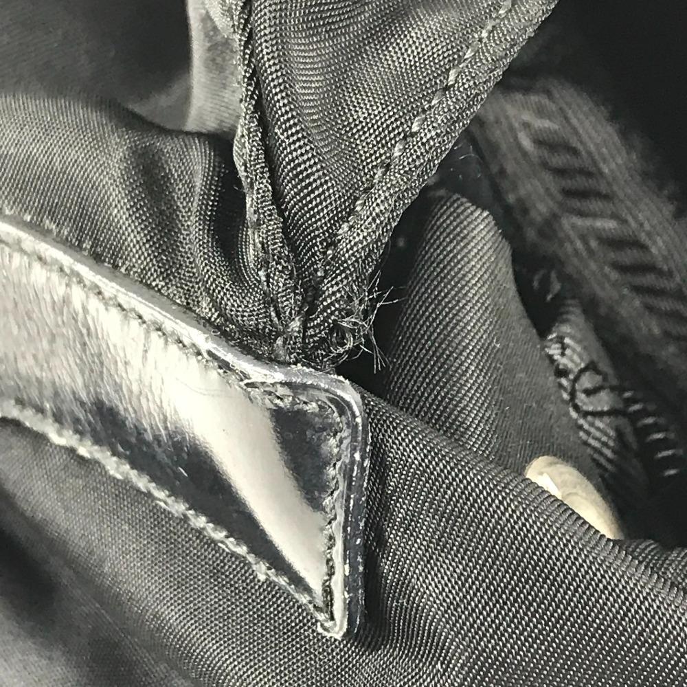 Prada Tasche mit dreieckiger Logo-Platte Rucksack Leder / Nylon Schwarz