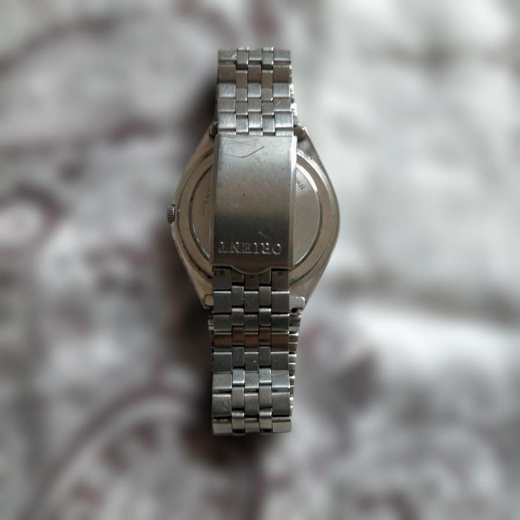 Used [Working item] ORIENT QUARTZ watch body