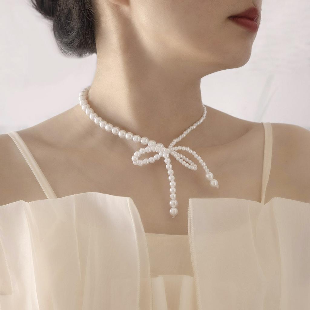 French Light Luxury Asymmetrical Pearl Bow Collarbone Chain Simple Sweet Cool Elegant Temperament Fringe Necklace