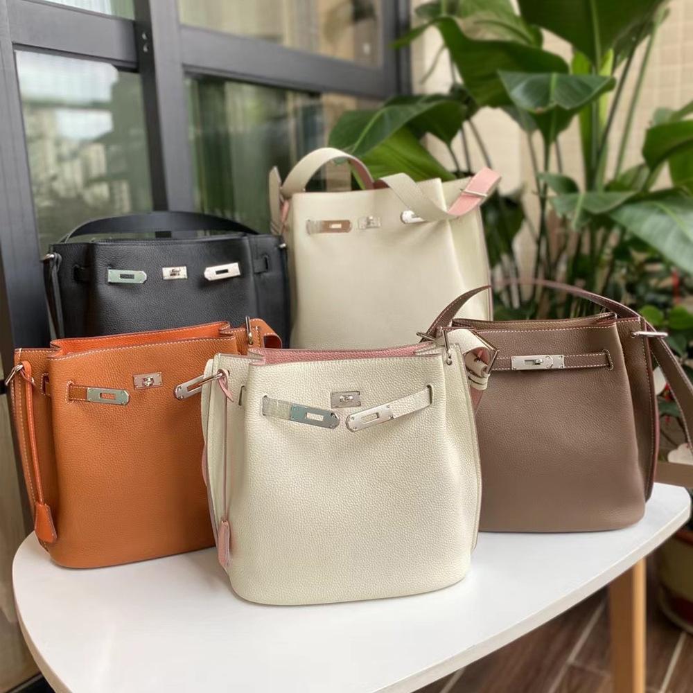 Τσάντα από δέρμα αγελάδας Νέα χιαστί τσάντα-κουβάς Μοντέρνα casual τσάντα ώμου για κάτω από τον ώμο Πρώτο στρώμα δέρμα αγελάδας Κάθετη τσάντα για καθημερινή χρήση