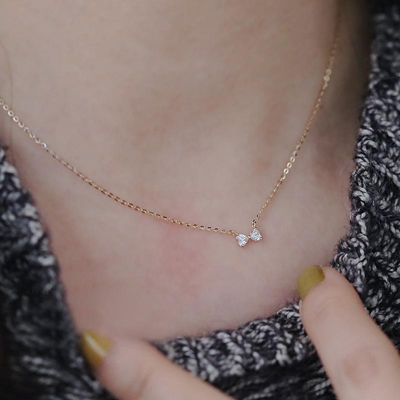 Hot Sale S925 Sterling Silver Bow Necklace with 14k Gold Heart-Shaped Pendant - Light Luxury Ins Style.