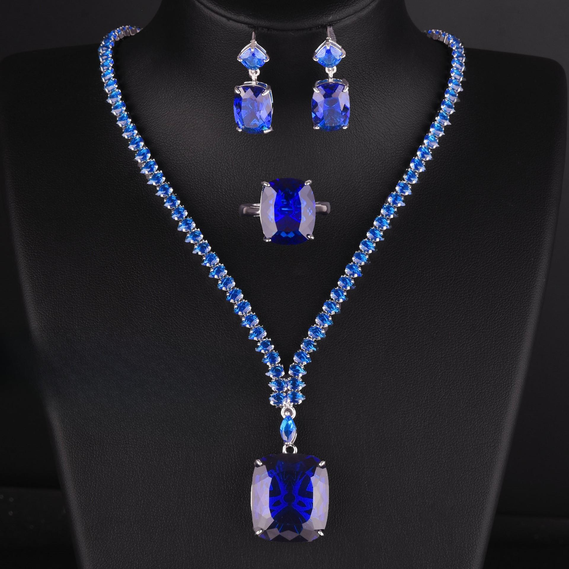 

Ожерелье с аквамариновым топазом 20 карат, цветные серьги-гвоздики, кольцо «Параиба», комплект из королевских синих и желтых бриллиантов