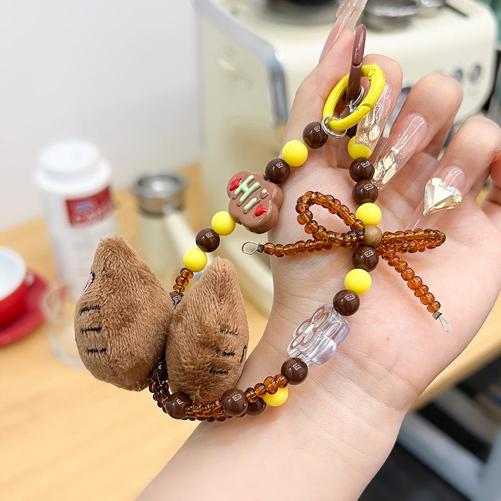 Plush KT cat mobile phone chain, colored beaded bag, pendant, keychain, personalized mobile phone lanyard, creative student couple model.