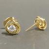 Boucle d'oreille clou en métal couleur or avec design spirale et oxyde de zirconium unique, boucles d'oreilles de mode pour femmes, bijoux simples et polyvalents pour piercing d'oreille