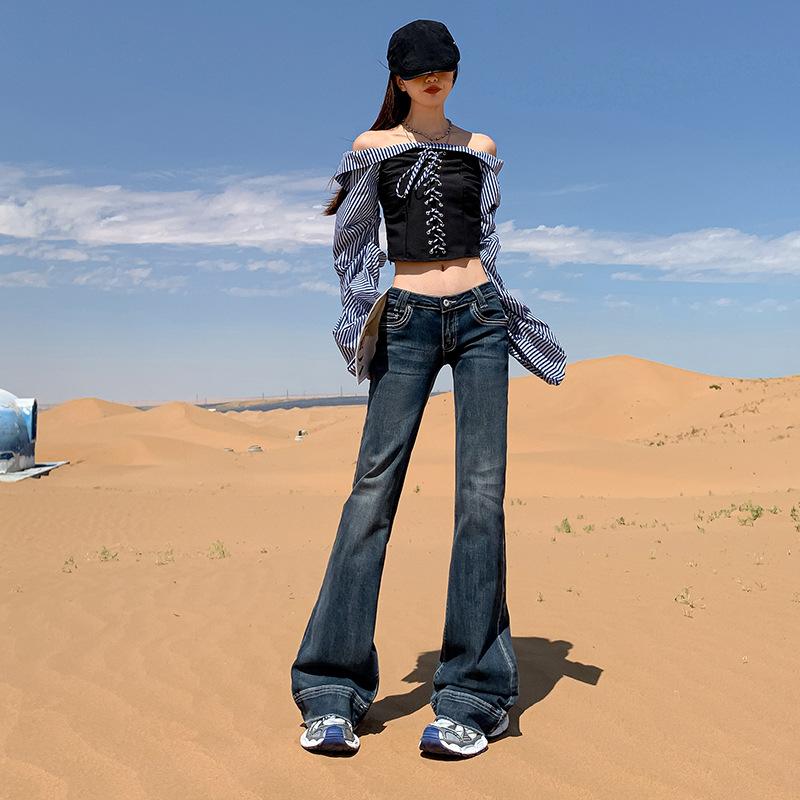 Washed dark blue low-rise slightly pulled jeans women's autumn and winter new Spice Girl elastic and thin versatile bell pants