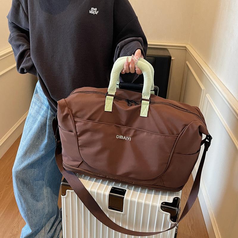 Large-capacity short-distance travel, business travel, luggage, accommodation, overnight delivery, clothing storage bag, textured commuter handbag