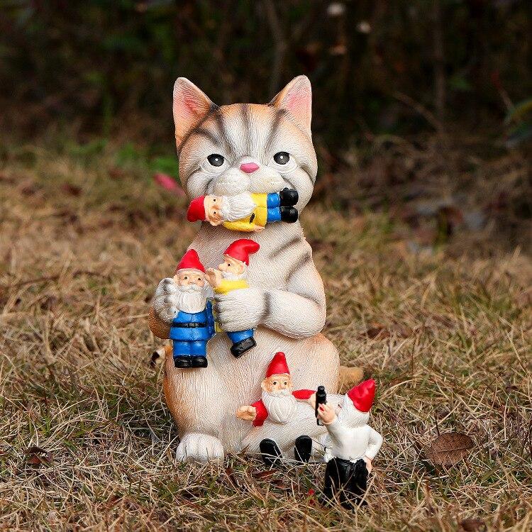 Dinozaur care mănâncă gnomi de grădină ornament din rășină pisica rea ​​Gnomi de grădină artizanat din rășină statuie decorare statui de grădină