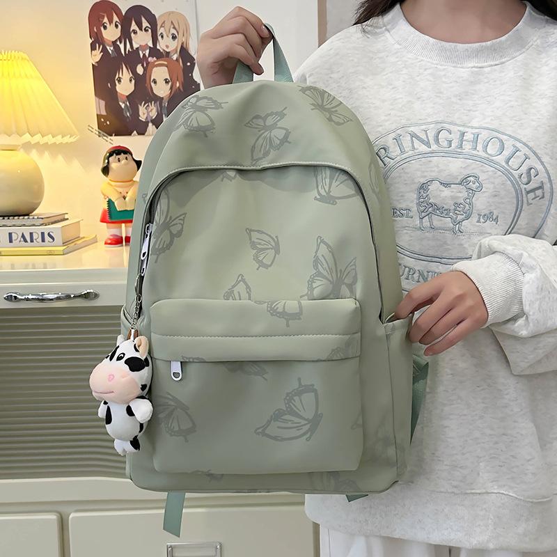 High-value reflective butterfly backpack, new junior high school girl high school student schoolbag ins niche travel backpack